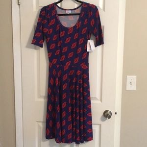 S Lularoe Nicole NWT. Purple and red.